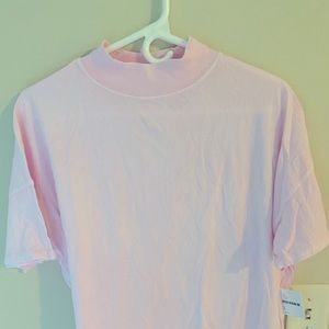 Free people mock neck tee shirt. Bright light pink color